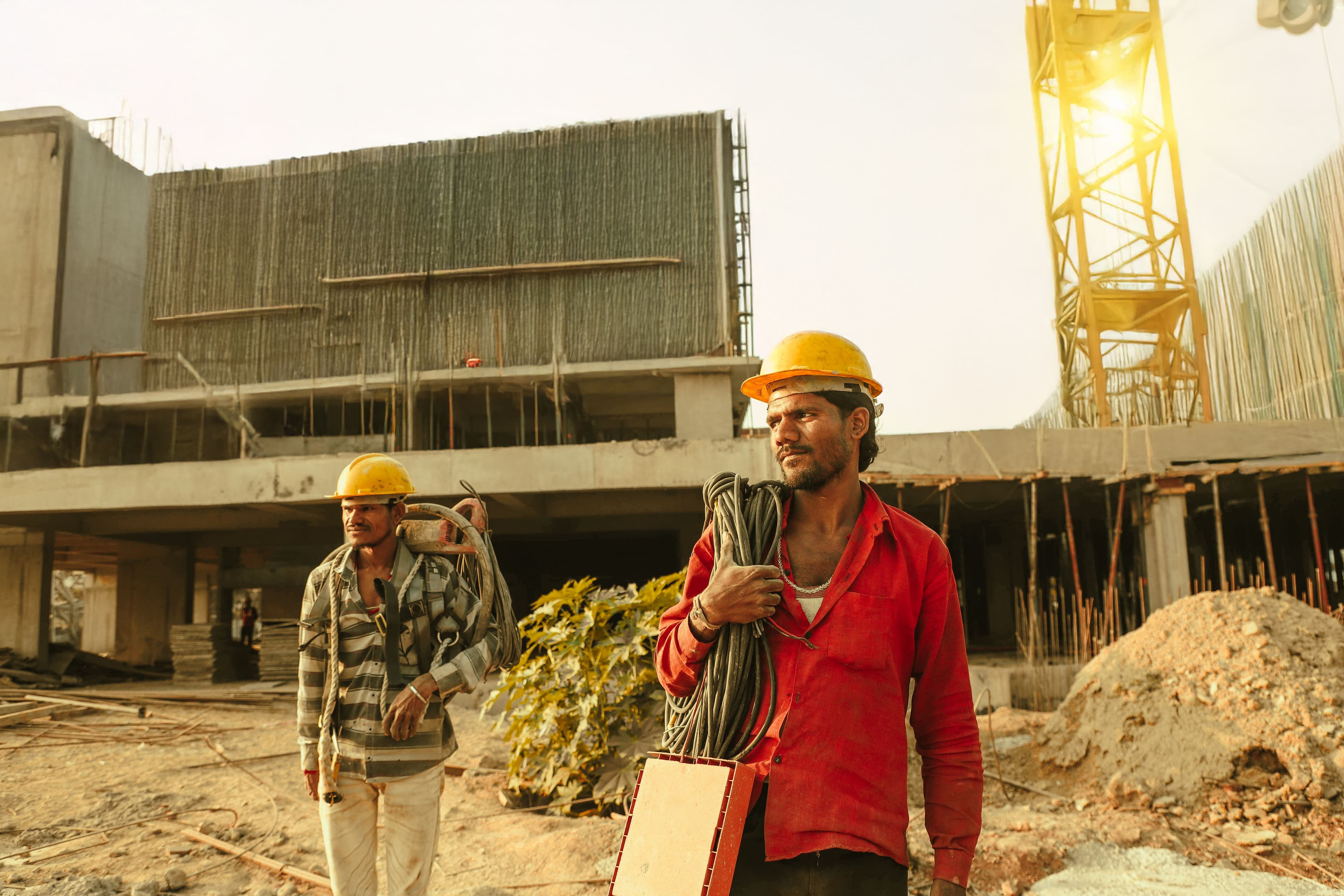 Construction workers executing complex infrastructure project